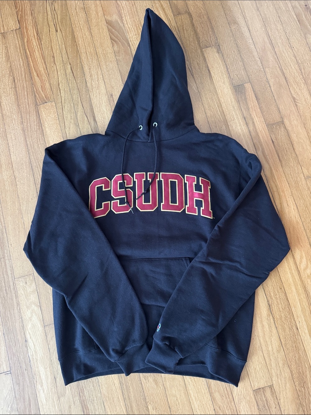Black CSUDH Hooded Sweatshirt with Red Lettering